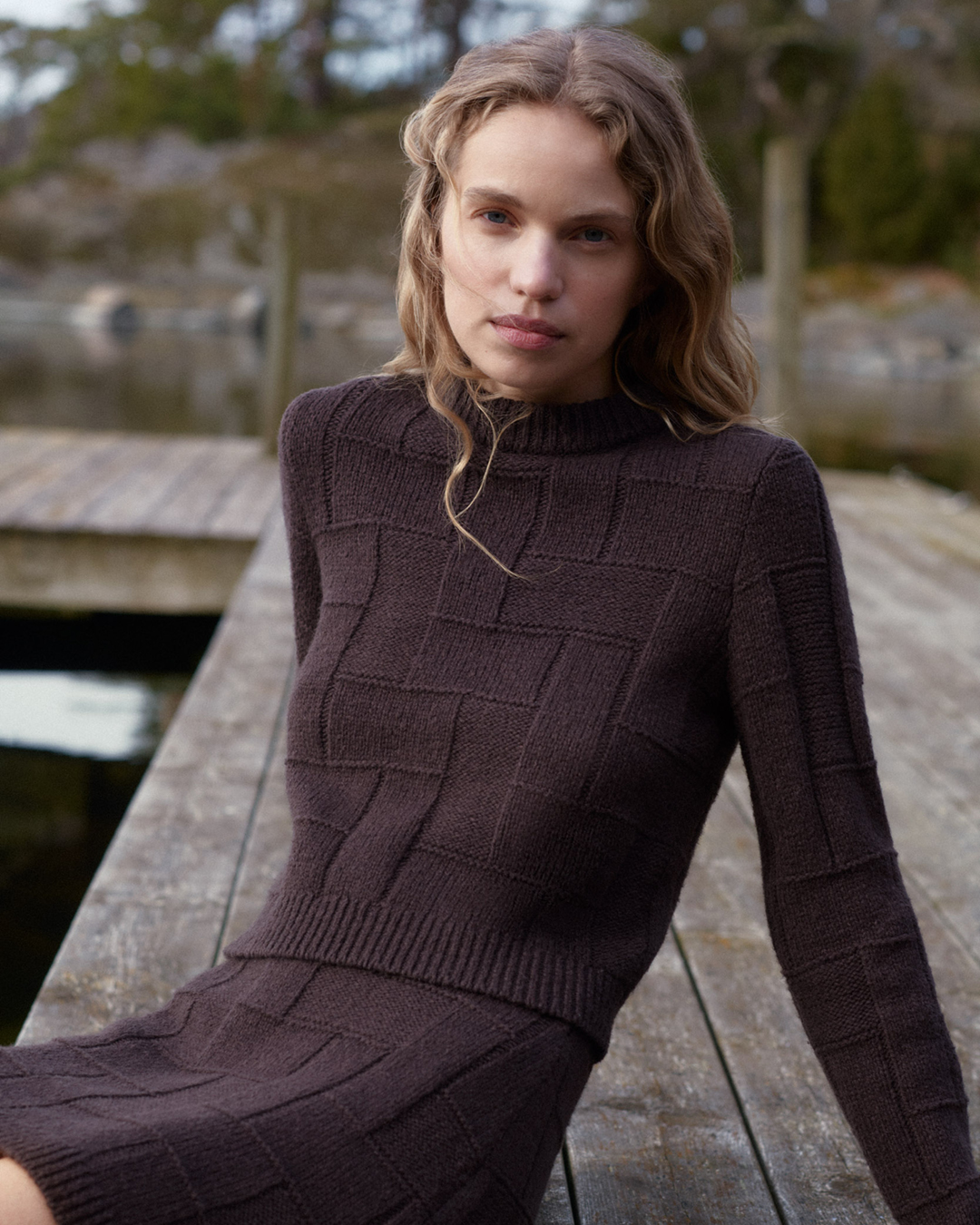 Woman in brown knitted set